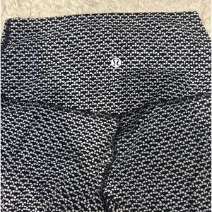 Navy blue and white leggings size 4. In excellent condition.